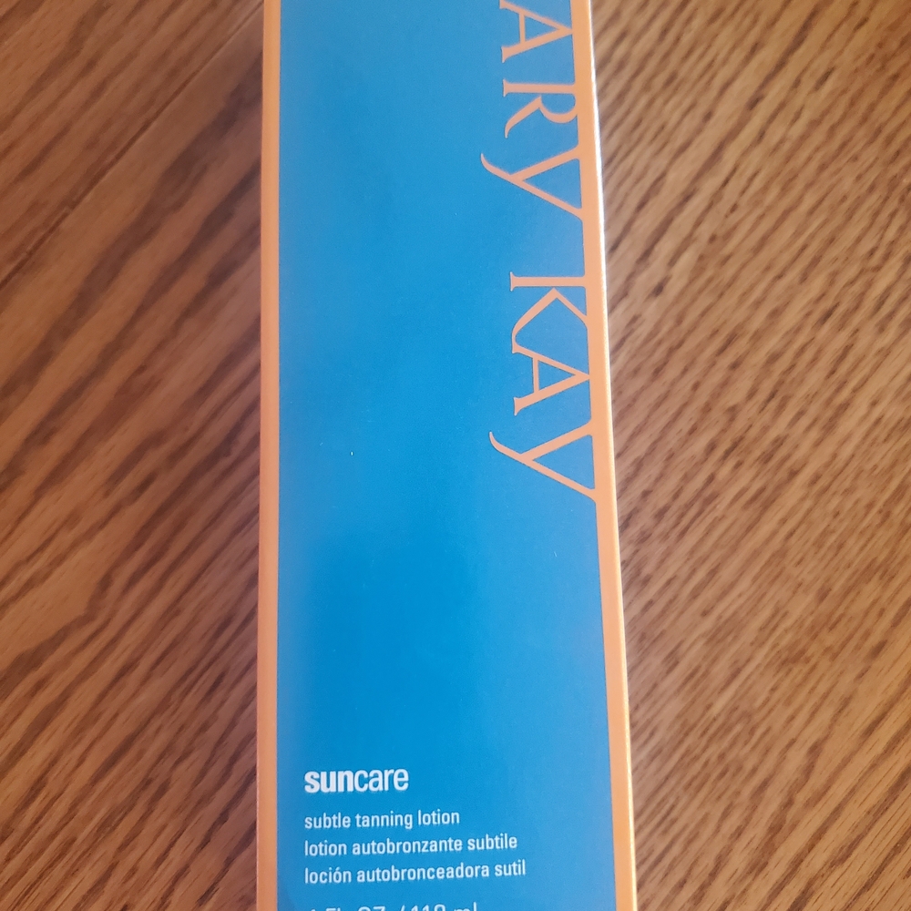 Mary Kay Suncare Lotion in Blue and Orange.  Tanning Lotion